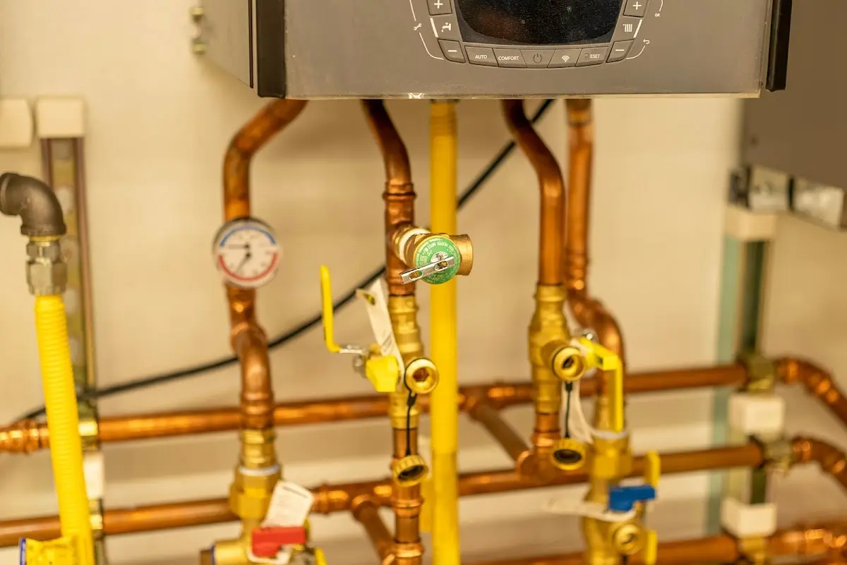 Licensed technician providing Water Heater Installation for a homeowner in College Station